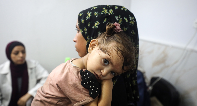 A child and her mother in Gaza.
